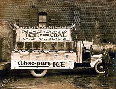 Image of a Leach truck loaded with blocks of ice. In earlier years, the ice was delivered by horse-drawn wagon.